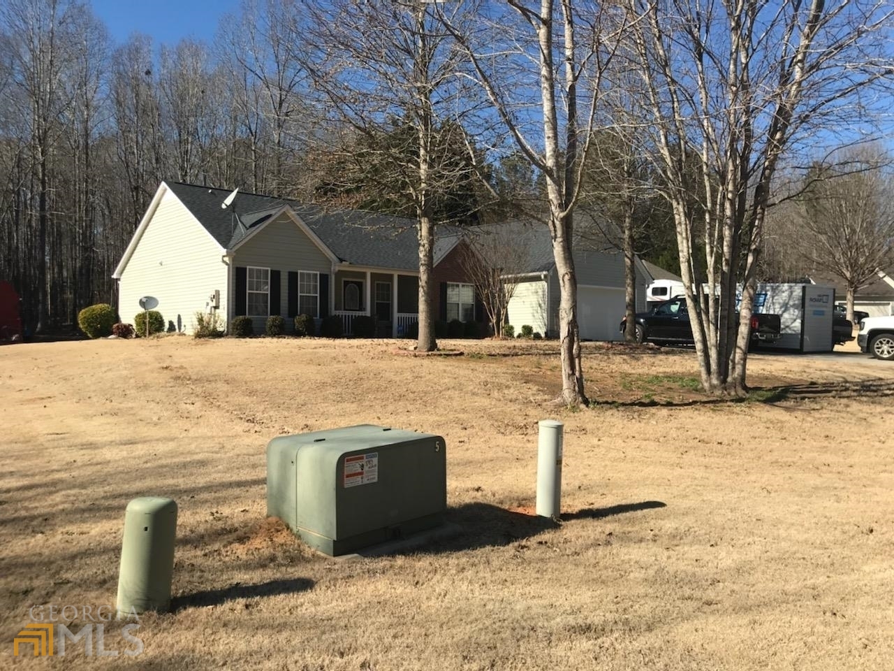 This is a wonderful 3 bedroom 2 bath home that is ready for you to call it your home. It is located on a quite culdesac with a level lot with a large two story storage building. The lot size is approximately 3/4 of an acre. Inside the home has a roommate floor plan with a great room and fireplace to enjoy on cozy evenings. The kitchen is bright and has room for your family to eat by bright window display and enjoy the backyard! Come see all the wonderful space and grab this up soon!