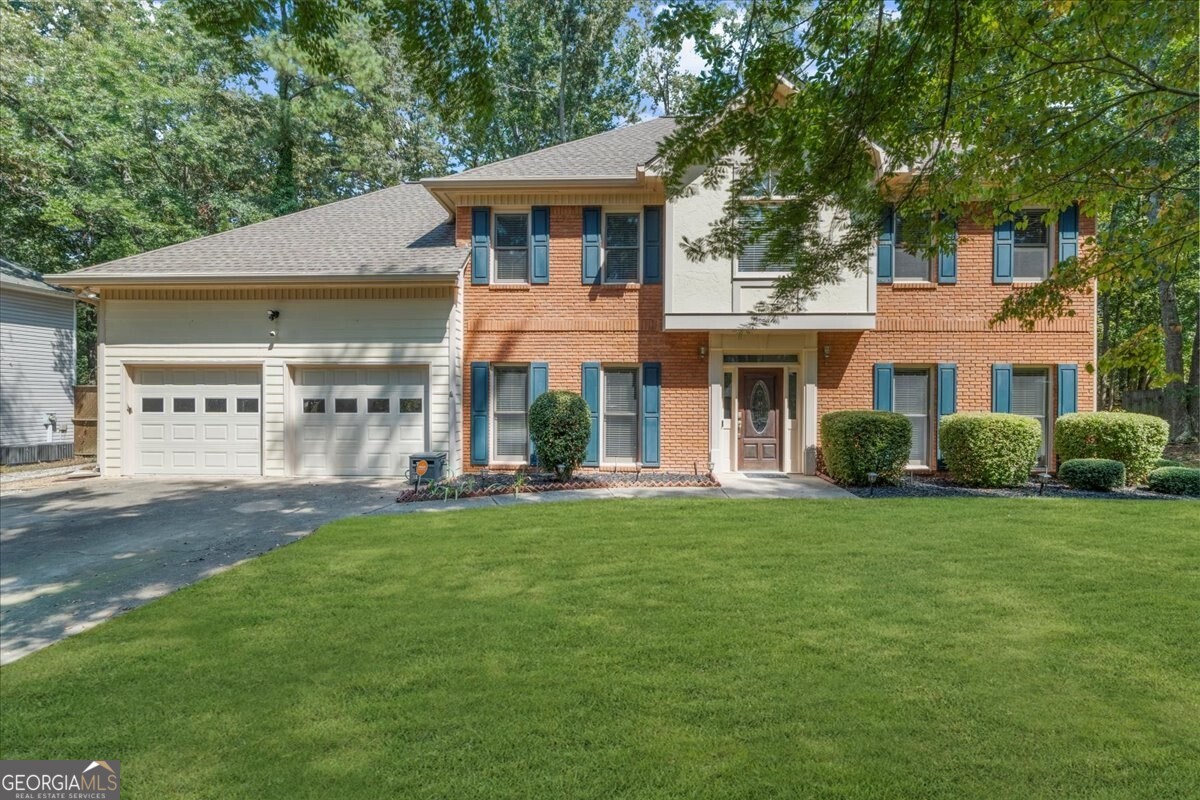Don't miss your chance to own this beautiful Cobb County home! Featuring 4 bedrooms, 2.5 bathrooms, and abundant storage, this property is full of charm and functionality. Inside, you'll find crown molding throughout the main level and master suite, along with durable LVP flooring that flows through the main floor, stairs, and upper hallway. The kitchen shines with two pantries, stainless steel appliances, granite countertops, and both under- and over-cabinet lighting. The master retreat boasts a tray ceiling and oversized walk-in closet, while the spacious 4th bedroom (bonus room) includes two walk-in closets and a private balcony. Note: Tax records do not reflect the additional square footage of this room. Step outside to a screened-in porch overlooking the fenced backyard, plus a covered deck that makes grilling and entertaining easy year-round. A gravel pad on the side of the house is perfect for your trailer, RV, or boat storage. Two backyard storage buildings will also remain with the property. Recent updates include a new upstairs HVAC system and a hot water heater that's just one year old.