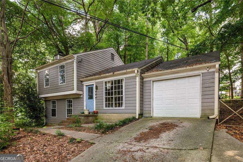 With an assumable VA loan at 3.5%, this Duluth home has all the flexibility to work as a smart investment or a perfect first home. Set back from the main road, this home brings surprising privacy under a canopy of trees. Renovated in 2017, it features hardwood floors, a neutral palette, and great natural light-ready for your own personal touches. The kitchen brings the style with butcher block countertops, a gas stove, and updated cabinetry, while both bathrooms have modern tile and fixtures. Ceiling fans, lighting, and finishes have all been updated, so there's no guesswork on what needs to be done. Major systems, including the roof, HVAC compressor, and water heater, are 8 years old. Out back, the spacious yard offers plenty of room to garden, relax, or let pets roam, and there's a handy storage shed for all the extras. Enjoy a one car garage, no HOA and low-maintenance living making this one a smart, move-in-ready option.