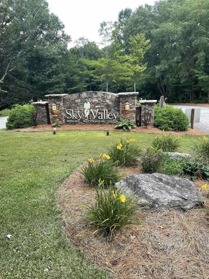 Great Building lot - Long Range Mountain Views when you cut trees - 1/2 acre in a well established neighborhood - 3 minutes from Sky Valley Club entrance - Underground Utilities - Water - Garbage Pick up are all available