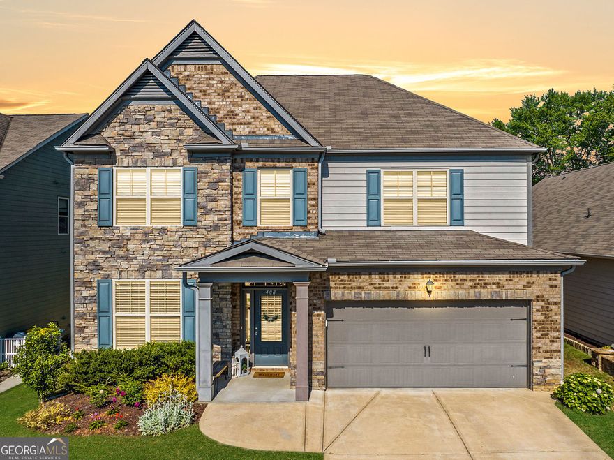 Tucked away in a quiet cul-de-sac, this spacious four-bedroom home combines comfort and elegance perfectly. Inside, you'll find a welcoming layout where the living and dining areas flow smoothly together, featuring a beautifully crafted coffered ceiling in the dining room. The kitchen is a chef's dream, equipped with stainless steel double ovens, a cooktop, microwave, quartz countertops, and tall 42-inch cabinets. Adjacent to the kitchen, the breakfast area opens up to a spacious family room centered around a cozy gas fireplace, ideal for social gatherings or relaxing evenings. A main floor guest suite is perfect for hosting friends or family overnight.   Upstairs, the large master suite is a peaceful retreat with its own sitting area. The luxurious master bath boasts a soaker tub and a separate tile shower, creating a spa-like atmosphere at home. The secondary bedrooms are all generously sized, providing ample space for family, guests, or a home office. An oversized loft is the perfect place to relax with a good book, watch a movie or gather and play games.  Located in a highly sought-after school district, this home offers the perfect blend of lifestyle and location.