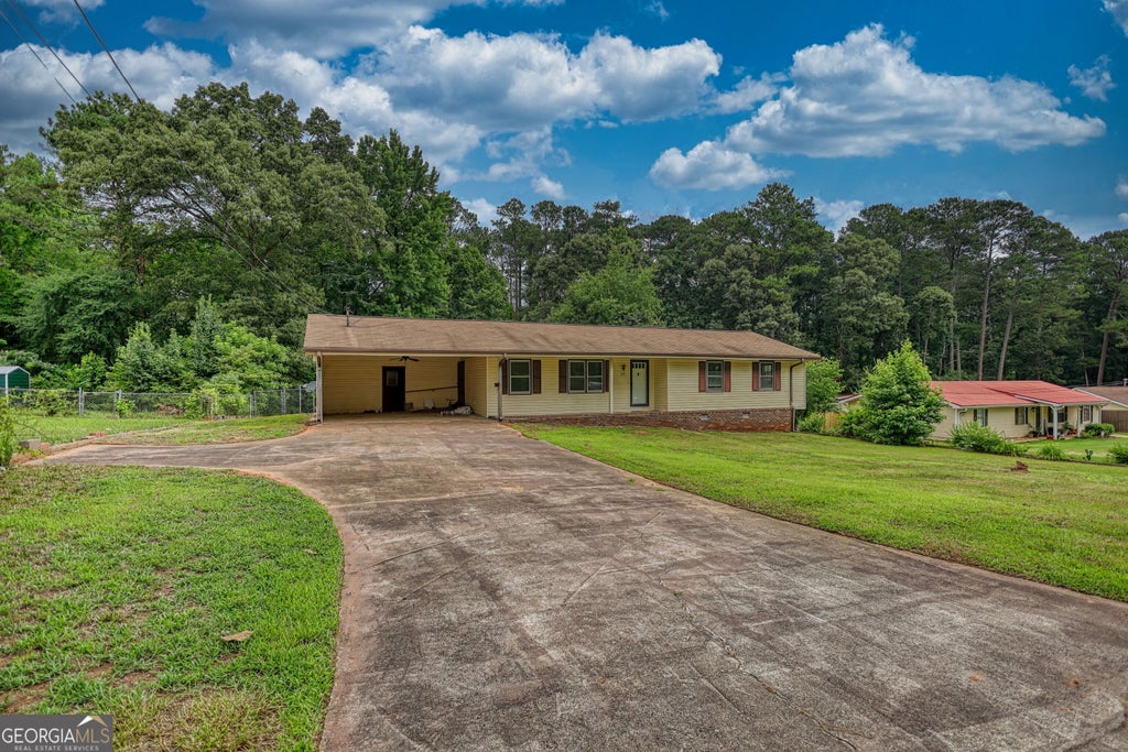 Photo of 755 Navajo Trail, Covington, GA 30016 (MLS # 10790917)