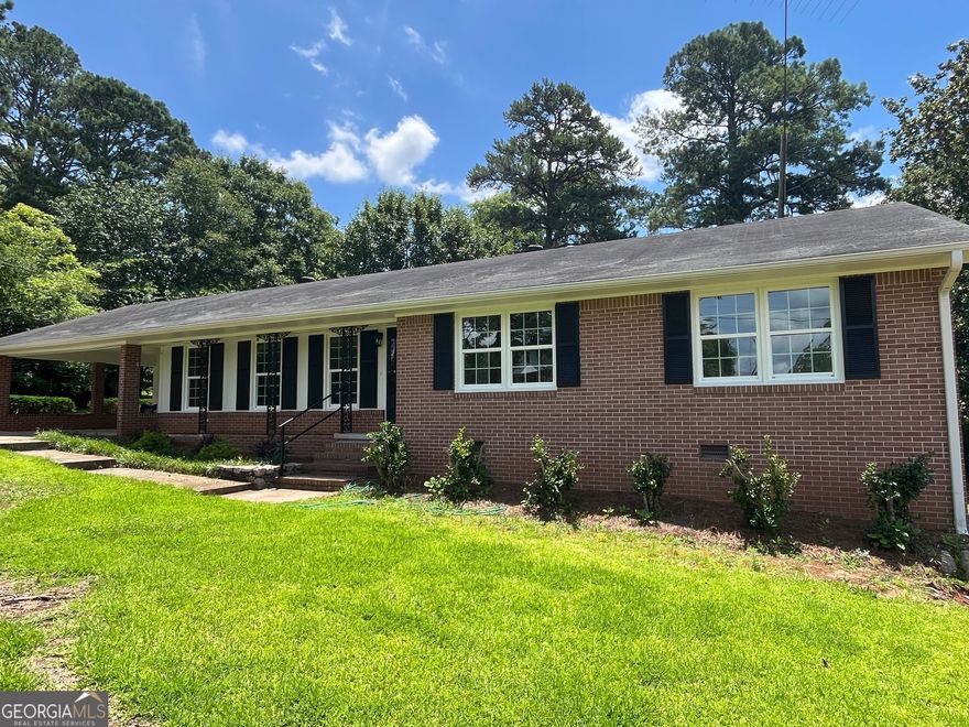 This lovely 3 bedroom, 2 bath brick ranch has been totally renovated and remodeled. A completely remodeled kitchen features custom white shaker cabinets with self closing drawers, quartz counter tops, a 7 foot breakfast bar and all new stainless appliances.  All hardwood flooring has been beautifully refinished in the living room, dining room, hallway and bedrooms. New flooring has been installed in the kitchen and laundry room. The laundrey room/office/flex features a built-in desk and custom cabinetry.The large family room includes a fireplace and an attractive vaulted ceiling with beams. All electrical has been upgraded including the addition of recessed lighting and new ceiling fans throughout. The plumbing has been upgraded featuring new fixtures which have a contemporary flair. The master bath is updated with new tile, a LED lighted mirror and fixtures. The large hall bath features a double vanity with sleek modern fixtures and a LED lighted mirror and  new fixtures in the tub/shower. All windows are new. Keyless locks are another extra. The home provides good storage and closet space. The entire home has fresh paint. New privacy fence has been installed. The basement area provides ample equipment storage. Move in ready and conveniently located minutes from town, shopping and schools.