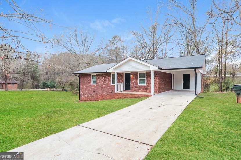 Don't miss this classic brick ranch located in the heart of Oxford, GA. Offering solid construction and timeless appeal, this home is perfect for homeowners or investors looking to personalize a home in a peaceful, established community. Inside, you'll find a traditional floor plan with spacious living areas, a functional kitchen, and generously sized bedrooms. Situated on a level lot with mature trees and a private backyard, the property also includes a driveway with ample parking and a quiet street setting-ideal for enjoying the calm of suburban living. The Longstreet Circle neighborhood is known for its friendly atmosphere and close-knit community feel. Located just minutes from historic downtown Oxford and nearby Covington, residents enjoy access to local shops, parks, dining, and the prestigious Oxford College of Emory University. Commuters will appreciate the easy access to I-20 for travel into Atlanta.