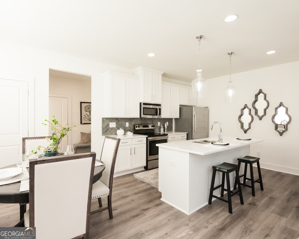 Photo of 303 Barracks Way #885, Hoschton, GA 30548 (MLS # 10815042)