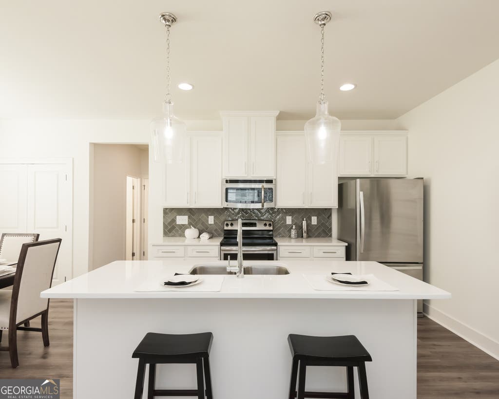 Photo of 303 Barracks Way #885, Hoschton, GA 30548 (MLS # 10815042)