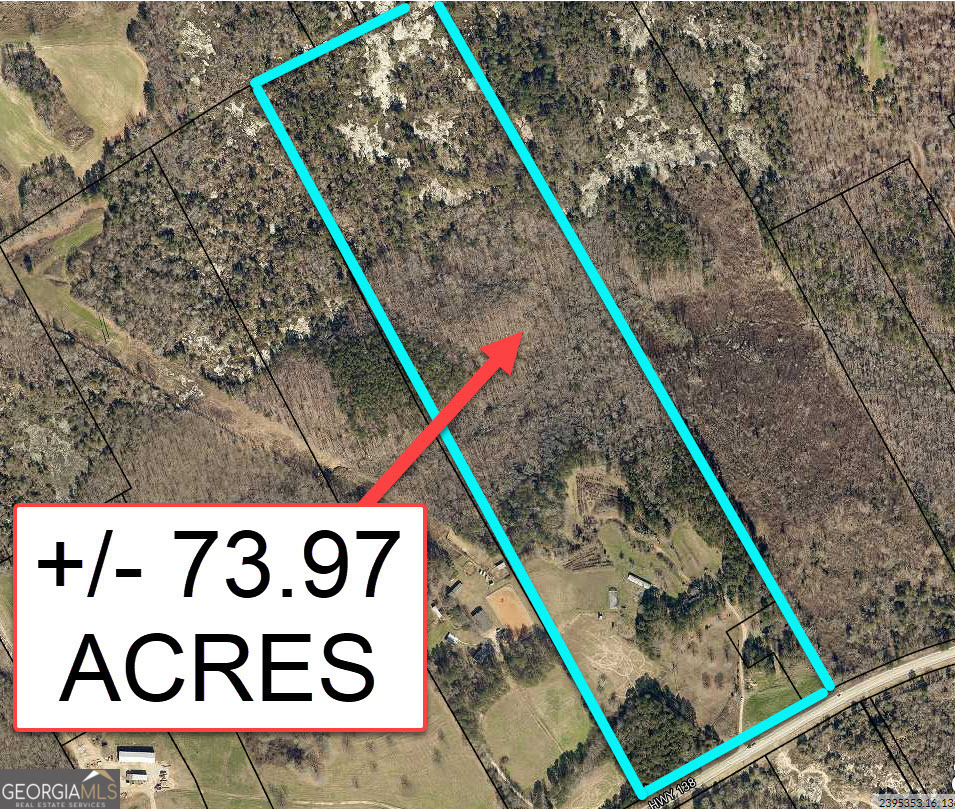 +/- 73.97 ACRES, GA Highway 138, Covington, GA This listing consists of a (+/-) 73.97-acre tract of land zoned A-1, rural estate, located along the north side of Georgia Highway 138 just east of the city of Walnut Grove and approximately 1.2 miles east of the intersection of Georgia Highway 138 and Georgia Highway 81 in the southwest section of Walton County, Georgia. The tract contains (+/-) 955 linear feet of road frontage along the north side of Georgia Highway 138. The property is located approximately 7 miles southeast of the city of Loganville, 7 miles southwest of the city of Monroe, 11 miles northeast of the city of Covington, and 32 miles east of downtown Atlanta, Georgia. The tract has a diverse terrain that will support a variety of residential, agricultural, and recreational uses that are allowed under the existing zoning. Approximately 15-20% of the land is open area with a moderately rolling topography, and the remaining sections of the site are heavily wooded with a topography that ranges from moderately rolling, rolling, and steep in some sections. The open areas on the tract were previously utilized as an organic farm and contain site improvements from the previous farming operation including water irrigation wells, framing for arch greenhouses, storage/shed structures, a (+/-) 960-square foot wood frame structure (shell only) that was a previous single family dwelling unit, electric service lines, and dirt/gravel service roads. The wooded areas consist mostly of mature hardwood forests with a few mature pine tree forested areas. The site is bisected by a creek, which appears to be perennial, that is approximately 3-5 feet wide (with normal rainfall) and is a tributary to Cornish Creek. A system of interior dirt/gravel service roads, woods-roads, and trails provide access to most sections of the site. The combination of open areas, forested areas, and the bisecting creek produce a tract with good aesthetic appeal. Access is provided to the north section of the site over the existing bisecting creek by a culvert supporting an interior woods-road. The surrounding 1-mile area east of the property along Georgia Highway 138 is primarily a single-family residential and limited agricultural district that contains a mixture of custom-built homes on acreage tracts and single-family residential tract developments. The surrounding 1-mile area west of the property along Georgia Highway 138 includes areas within the city limits of Walnut Grove that are zoned for a mixture residential, limited agricultural, and commercial uses. Major traffic arteries within the surrounding 5-mile area include GA Highway 138, GA Highway 81, and U.S. Highway 78 which all provide access to shopping and employment districts. The property is located along the westbound lane of Georgia Highway 138 which is a 2-lane state highway that connects the city of Monroe and the city of Walnut Grove within Walton County, and it intersects U.S. Interstate 20 within the city of Conyers (+/-) 12 miles southwest of the property. The property is located within the Walnut Grove Elementary School district, the Youth Middle School district, and the Walnut Grove High School district. The tract has potential to support a low-density single-family residential development, use as an acreage residential estate tract (s), agricultural uses, and recreational uses. Subject to rezoning, the location and physical characteristics of the site also have the potential to support a variety of commercial uses. The property is shown by appointment only; please do not enter the site without permission.