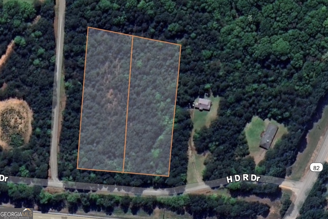***Owner financing is available, ask for details if interested*** Don't miss this rare opportunity to own a total of 3.06 acres across two adjoining wooded parcels (APNs: 048 003C1 & 048 003C) located in Jackson County, Georgia. With road frontage on H D R Drive, these residential lots offer convenient access and a peaceful setting just minutes from downtown Commerce, major routes like US-441, and I-85, which connects Atlanta to Greenville, SC. The land features gently rolling terrain with mature trees, creating a private and natural environment perfect for building a custom single-family home or holding as an investment. Zoned for residential use (R-1 or similar), the property allows for the development of single-family homes in a quiet, rural setting that remains close to modern conveniences. Electricity is available at the street, and natural gas service is also accessible, making the property well-suited for development. Located within the Jackson County School District, nearby schools include Maysville Elementary, East Jackson Middle, and Jackson County High School. Medical services are easily reachable in Commerce or Jefferson, and residents will enjoy shopping and dining options at Tanger Outlets and other local businesses. This property is ideal for homeowners, builders, or investors looking to take advantage of North Georgia's growth. With natural beauty, essential infrastructure in place, and close proximity to schools, highways, and amenities, these two parcels offer a perfect blend of rural charm and suburban access. Contact us today to learn more about this exceptional land opportunity.