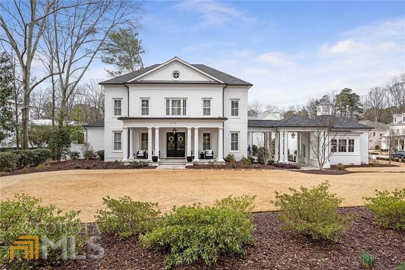 Rare opportunity to live in downtown Alpharetta's most coveted gated neighborhood, Twelve on Canton. Designed by renowned architect, Stephen Fuller, and built by New River Building Co, this custom built home is a perfect marriage of efficiency and beauty. As you enter the home, you will find the study with reclaimed wood beams, and the large dining room with custom millwork floor to ceiling. The large open floor plan offers views of the gourmet kitchen from the great room. A chef's dream, the kitchen features custom cabinetry, a large island, wolf & subzero appliances, and a wine tower that hold over 250 bottles of wine. The Butlers pantry features a beverage center, oversized pantry, and connects the kitchen to dining room for seamless entertainment. The Owner's suite on the main level views the private backyard and also includes a large owner's suite bathroom with dual vanities, two large closets. Upstairs includes two large bedrooms with private bathrooms. Additionally, upstairs includes a bonus room, and an additional office space including a beverage center. Enjoy your evenings fireside on the screened porch or entertain guests on the cooking porch which includes appliances, an island, and dining area. The backyard has extensive landscaping, fencing, and a privacy fence to ensure it is the oasis you have been looking for. Backyard has a firepit with gas line from the house and is large enough for a pool.