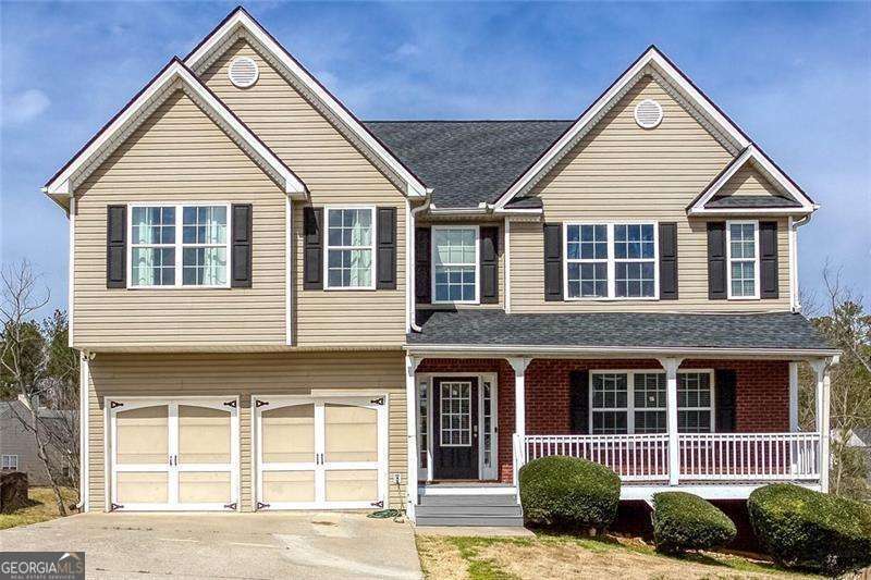 No tariffs on this spacious 3960 square feet 5 bedroom 2.5 bathroom home with 1,180 square feet of unfinished basement space with 9 ft ceilings. This home is nestled just minutes away from all of the local amenities. It is 4.4 miles from the local Kroger, 6.8 miles from the Wellstar Paulding County Hospital, 3.2 miles from Downtown Dallas for dinning, shopping, and local community events, 5 miles from the local elementary school, 3.4 miles from the local middle school, 4.8 miles from the local high school, 6 miles from the local soccer park, and 8.5 miles from the Hiram Shopping district and the new Harbor Freight. As you turn into the Overlook Subdivision, you pass the clubhouse, pool, and community mailboxes. The rest of the neighborhood is filled with well-maintained properties and neighbors of all ages, see the adults walking the neighborhood and kids playing outside. Whether you are taking an afternoon stroll around the neighborhood or walking 1 block to the Silver Comet Trail entrance, walking or biking is accessible for those looking to enjoy the outdoors year round. This home has been well taken care of and has a lot of recent upgrades from the indoors to the outside. Whether you are looking to raise and grow your family or for room for your large family to have their own space to accommodate everyone, come make this your family's dream home and community.