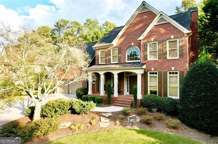 Nestled in the sought-after Chattahoochee Run neighborhood of Suwanee, GA, this beautifully maintained home offers modern upgrades, exceptional living spaces, and access to premier community amenities.   With a stately 3-sides brick exterior and newly refinished oak flooring, this inviting property balances elegance and comfort from the moment you step inside. The main floor welcomes you with a grand 2-story foyer, flanked by a formal dining room and a versatile office/bonus room. An inviting family room features a cozy stone fireplace and custom built-in shelving. The open kitchen flows seamlessly into the breakfast and family areas, making it ideal for gatherings. Updated with exotic granite countertops and a central island for extra counter and storage space, the kitchen is both stylish and functional. A convenient walk-in laundry room adds ease to daily living, while a screened-in deck with a stacked stone ventless fireplace provides a serene outdoor retreat overlooking the professionally landscaped backyard.  On the top floor, the spacious owner's suite offers a private sanctuary with a fireplace and sitting area. The ensuite bath has been recently renovated with new floors, quartz counters, frameless glass shower, and an updated soaking tub. With two separate vanities and walk-in closets, plus a linen closet, the owner's suite provides both luxury and practicality. Three additional bedrooms, and a full bathroom with updated floors and countertops complete the floor. The entire top floor is equipped with a high end high-efficiency Lennox Ultimate Comfort system, installed just a year ago, for quiet, consistent climate control. A whole-house fan adds an extra layer of cooling efficiency.  The finished basement expands the living space, including a flexible bedroom, a full bathroom, and a room that can serve as a workout area, playroom, office, or craft room. The open recreation room is wired with Dolby Atmos 7.2.4 surround sound and is perfect for movie nights or entertainment. A utility room completes this level and provides space for a small shop and place to store your yard equipment.  There are a ton of smart features - Ring doorbell, Level smart lock on the front door, a video-capable garage door keypad, smart wifi connected garage door openers, a fingerprint door lock on the garage door. AT&T fiber internet available.  This home is located in a community that offers something for everyone: an Olympic-size pool, newly remodeled clubhouse, exercise room, 4 tennis courts, volleyball and basketball courts, playground, running trails, and a community garden.  Don't miss your opportunity to own this extraordinary home where modern luxury meets a vibrant, amenity-rich community. Schedule your viewing today and discover all that this Suwanee gem has to offer!