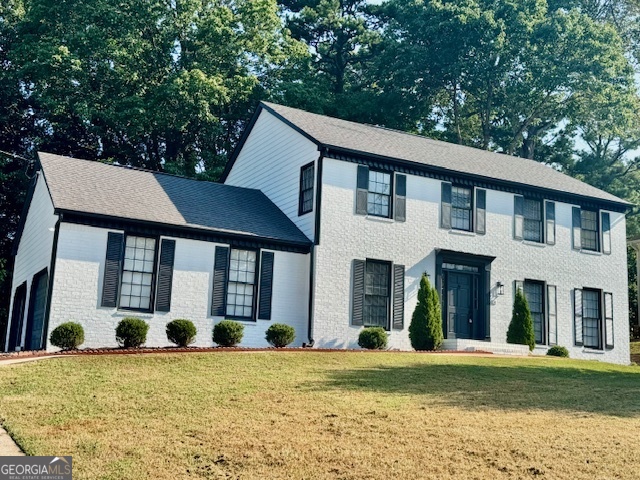 Experience the perfect blend of comfort and convenience in this spacious 4-bedroom, 2.5 bath home in a sough-after neighborhood in Decatur. With a bright, open layout and a private backyard oasis, this home is ideal for both relaxing and entertaining. This home features new paint inside and outside, new floors, new carpet, new HVAC system, new hot water heater, new light fixtures and more. This exceptional home offers a perfect combination of elegance, modern amenities, and a prime location, making it an ideal choice for those seeking a luxurious and convenient lifestyle. As you step inside, you'll be captivated by the grandeur and meticulous attention to detail. The spacious and open floor plan creates an inviting atmosphere and provides an excellent flow for both entertaining and everyday living. The gourmet kitchen is a chef's dream with white cabinets, featuring top-of-the-line stainless steel appliances, sleek granite countertops and spacious breakfast area. The primary suite is a luxurious retreat, offering a serene ambiance and ample space for relaxation with a master bathroom to die for. It features a spacious bathroom with large shower, dual vanities, and a walk-in closet. Three additional well-appointed bedrooms upstairs provide plenty of space for family members or guests, each designed with comfort and style in mind. The private backyard with a deck, is a great addition to this lovely home. Outdoor enthusiasts will appreciate the proximity to parks, trails, providing opportunities for recreation and leisure. This home will not last long. Hurry!!!