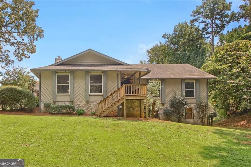 Spacious 6-Bedroom Estate on Private Cul-de-Sac in Rockdale County Welcome home to nearly 4,800 square feet of living space, perfectly designed for comfort, convenience, and entertaining. Nestled on 1.17 acres in a sought-after established cul-de-sac, this residence offers the privacy of suburban living with room to spread out both indoors and outdoors. Main Level Highlights * 4 bedrooms and 2.5 baths on the main level * Master retreat with dual oversized his & hers closets, French doors overlooking the backyard, and a spa-like bath featuring a separate shower and a garden jacuzzi tub with serene views * Formal dining room plus a separate eat-in kitchen for family meals and gatherings * Screened-in back porch leading to a fenced yard, perfect for enjoying quiet evenings or morning coffee Finished Basement Retreat * 2 additional bedrooms, a full bath, and a second kitchen-ideal for in-laws, guests, or extended family * Oversized living room with sliding glass doors that open to the backyard Outdoor Features * Fenced-in backyard with space to garden, play, or relax * A separate greenhouse for year-round planting * A large workshop of over 200 sq. ft. with an extended covered area for projects, storage, or outdoor entertaining The Opportunity This home is move-in ready but also offers incredible potential with some updating. The solid bones and flexible layout make it a perfect canvas to create your dream home. And with the price set well below appraised value, you'll walk into this property with instant equity-an opportunity rarely found in today's market. This property blends elegance, function, and space in one of Rockdale County's most desirable private neighborhoods. With its versatile floor plan, multiple living areas, and outdoor amenities, it's the perfect home for families, multi-generational living, or anyone seeking a peaceful retreat.
