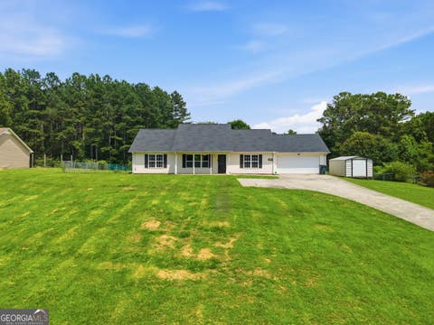 Photo of 589 Hall Memorial Road NW, Calhoun, GA 30701 (MLS # 10789237)