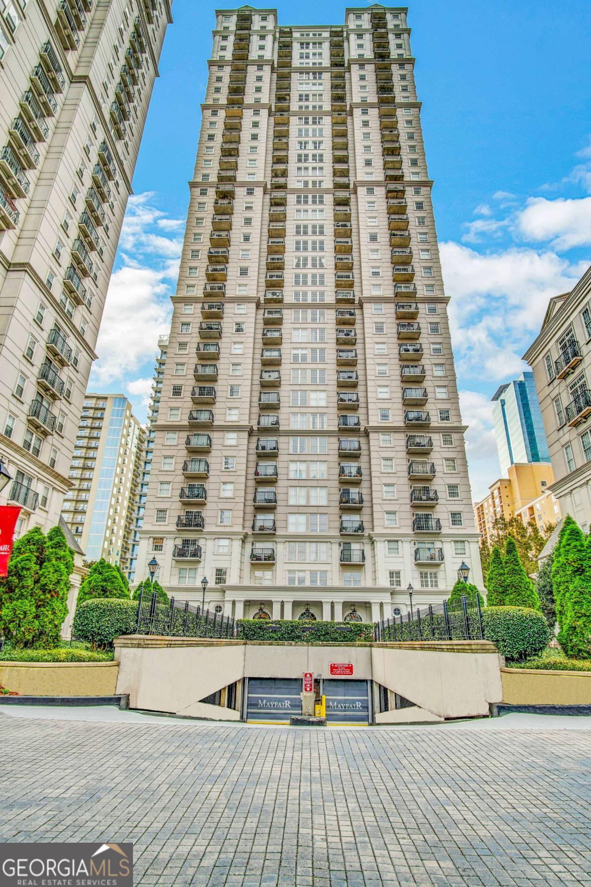 This spacious and well kept 1 bedroom plus den in one of Midtown's premier buildings is a great entry to the midtown lifestyle for under $300K! This unit has just been painted and has newer wood floors and looks like it has never been lived in. It overlooks the quiet courtyard with the soothing sound of it's two tier fountain. Other amenities for the building include a large and recently renovated fitness center, an expansive saline pool, both a clubroom and a garden room that can be reserved for your private events, a conference room, a theater and a 24 hour concierge. All of this is right in the heart of Midtown, steps from the High Museum, Symphony Hall, The Botanical Gardens and Piedmont Park, Colony Square, Whole Foods and Marta to make trips to the airport a breeze. This tyoe of in-town living has never been easier or more affordable!