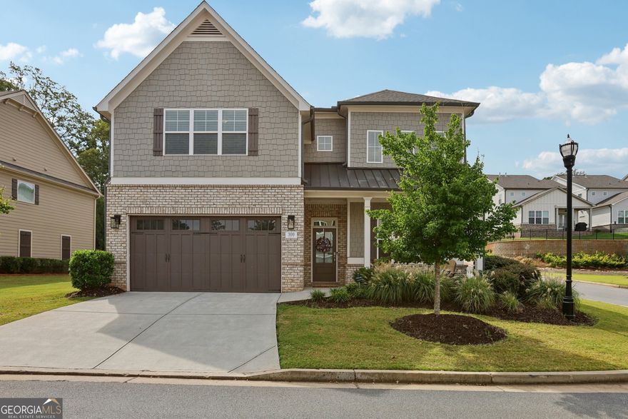 **Welcome to your dream home! This beautifully designed 3,074 sq ft, 4bed/4.5bath residence offers the perfect blend of luxury, comfort, and location. Nestled on a prime corner lot just steps away from the City Club Marietta golf course, this home is ideal for those seeking refined living in an unbeatable setting.  Step inside to discover an open-concept layout that seamlessly connects the living, and kitchen areas-perfect for entertaining or relaxing in style. The designer kitchen is a chef's dream, featuring high-end finishes, premium appliances, a spacious island, and custom cabinetry.  The elegant primary suite on the main level includes vaulted, tray ceilings, a spa-inspired primary bathroom completed with an OVERSIZED walk-in shower including rain showerhead and soaking tub, and a generous walk-in closet!   Each of the three spacious upstairs bedrooms boasts its own private en suite bathroom, providing ultimate comfort and privacy for family and guests alike.  Enjoy outdoor living with the covered porch and fenced in yard perfect for gameday BBQ's.  This home is a rare opportunity to enjoy upscale living in one of Marietta's most sought-after locations just minutes to the Marietta square. Schedule your private showing today!