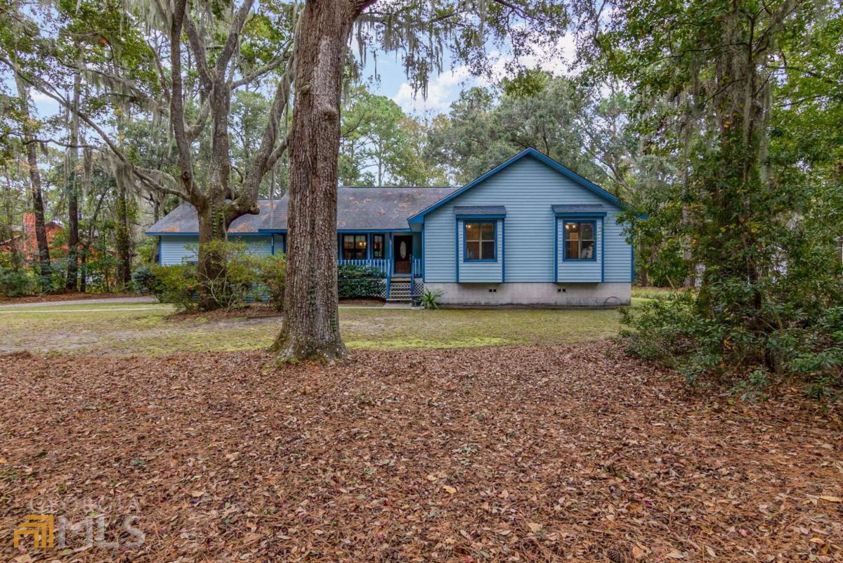 Follow the Huge Live Oaks dripping in Spanish Moss to your new home! A large front porch, screened in back porch and large private backyard makes this home a private oasis. Built in 1990, this well maintained 4 bedroom 2 bath home is being offered by the original home owners. Enjoy cozy nights in the family room that features a large brick fireplace and built-in bookshelves. The kitchen looks out to a large dining area perfect for family get-togethers or entertaining. The oversized two car garage lends itself to a perfect place to set up a work shop and offers plenty of storage space. Roof, HVAC were replaced in 2009. The water heater was replaced in 2015. New washer and dryer convey with the home. All utilities working and serviced.