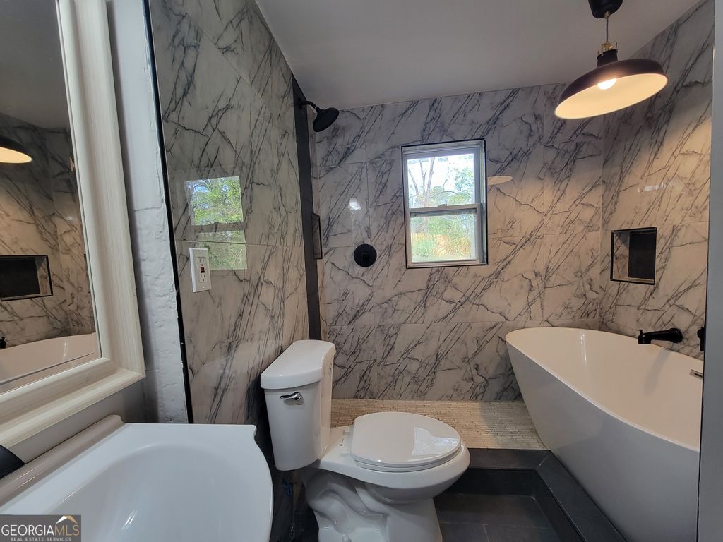 Photo of 723 Ford Place #A, Scottdale, GA 30079 (MLS # 10763014)