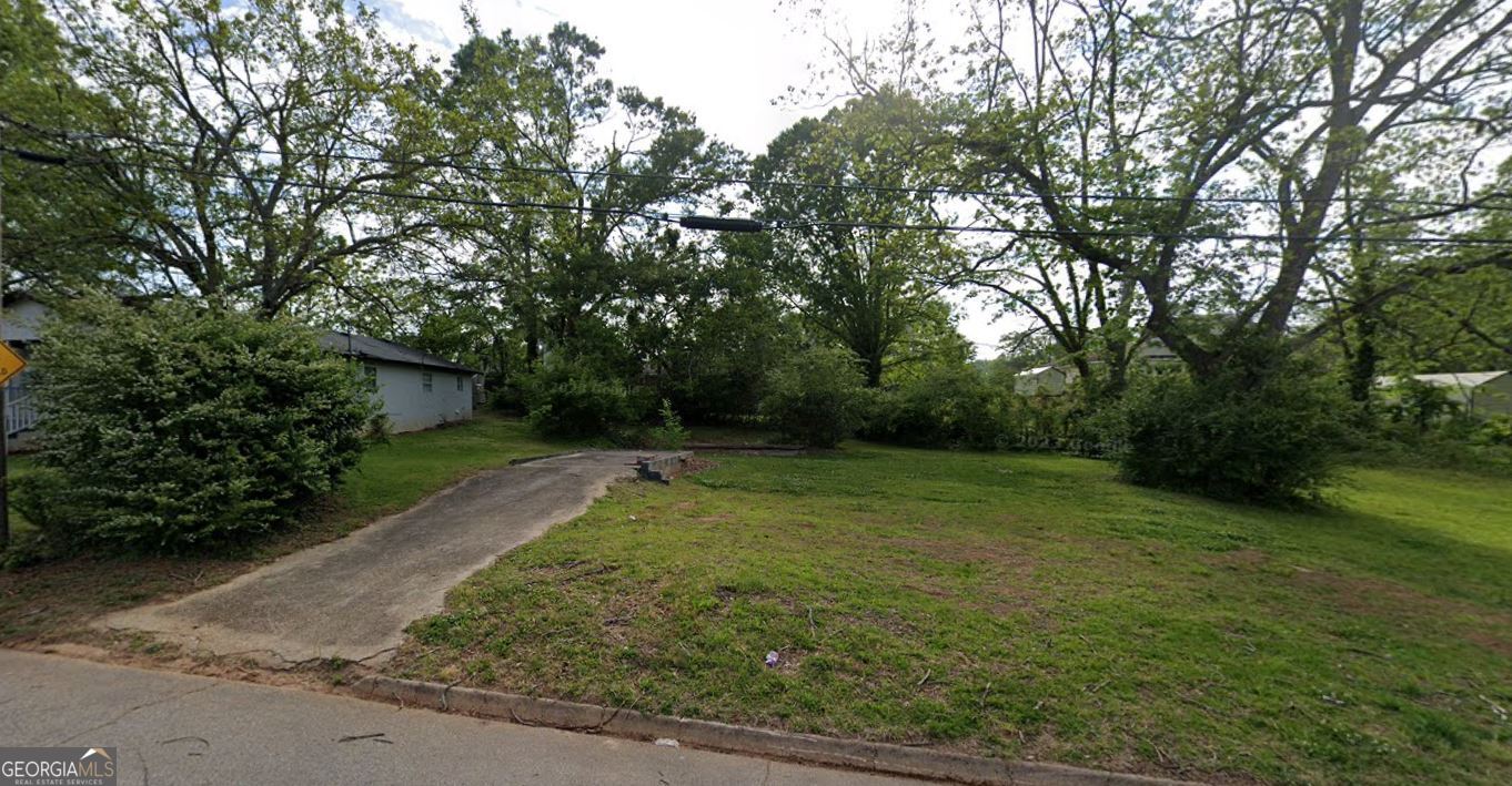 Unlock the potential of this 0.25-acre vacant lot, perfectly located in a zoned HDR-A (High-Density Residential - A). This property previously housed a duplex, which has been cleared, offering a clean slate for your next investment or custom build.