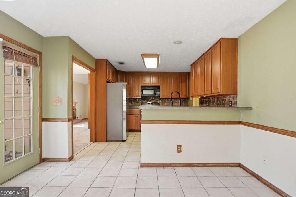 Photo of 889 Lakeview Road, Grayson, GA 30017 (MLS # 10666604)