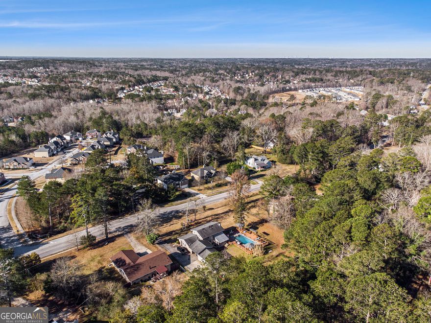 20+ acres near Hwy 124, Stonecrest Mall, Stone Mountain Park, and Hwy 78. Possible uses: Platted subdivision, home site, or recreation.