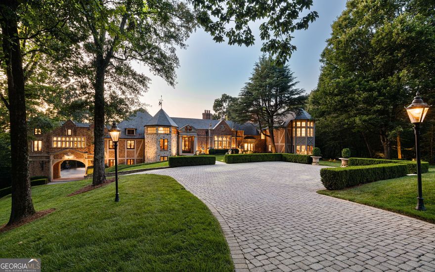 Majestic gates open to showcase a 17,000 square foot limestone and brick European inspired mansion that is strategically perched in the middle of the very private 18-acre property. The stunning architectural detail of the home exudes unparalleled grandeur and opulence, where no expense has been spared. 19th c. Parisian double entry doors open to an awe-inspiring art gallery that is magnified by a 19-foot plaster ceiling carved in the manner of the Braccio Nuovo Wing of the Vatican Museum. The centerpiece gallery spills out into an enormous Jerusalem limestone balcony with bespoke balustrades overlooking breathtaking grounds dotted with rare Chestnut Oaks and even more rare 18th and 19th c. curated statuary. This fanciful setting was once the site for a lavish wedding scene featured in the updated Dynasty TV series. Other productions such as "Black Adam" and "Ironheart" also chose Chestnut Hall as a venue for their films. There are seven remarkable and generous ensuite bedrooms, including a 2,400 square foot primary suite that encompasses an entire floor. As with the bedrooms, all living areas are spacious and resplendent. Whether it is the 16-seat dining room or custom-built kitchen with two oversized islands that flow into the breakfast area, or the lower level that features a four-room gym and spa with commercial grade selectorized equipment, barbells, dumbbells, boxing set up and a spa with steam, sauna and a massage nook, there is no skimping on space. Certain photos, however, do not capture the scale of some rooms due to camera limitations. Thus, the adage, Photos do not do it justice. There is an additional four-bedroom guest house and one-bedroom pool house with a full bathroom and kitchen. Every comfort and luxury has been accounted for at Chestnut Hall, including a state-of-the-art smart home control system, a full house generator and an advanced Rainbird IQ system that allows you to program landscape irrigation remotely on your mobile device. You can spend hours enjoying a large swimming pool with an 8-person jacuzzi, basketball court and baseball setup with every detail in perfect order. Chestnut Hall is a short drive to acclaimed schools and universities, iconic shopping, fine dining, museums, and sporting venues. This property comes unfurnished. The estate is move-in ready with every detail in perfect order. Chestnut Hall is a one-of-a-kind masterpiece that cannot be replicated and offers a once in a lifetime opportunity to a sophisticated buyer. Furniture, artwork and accessories can be purchased separately.