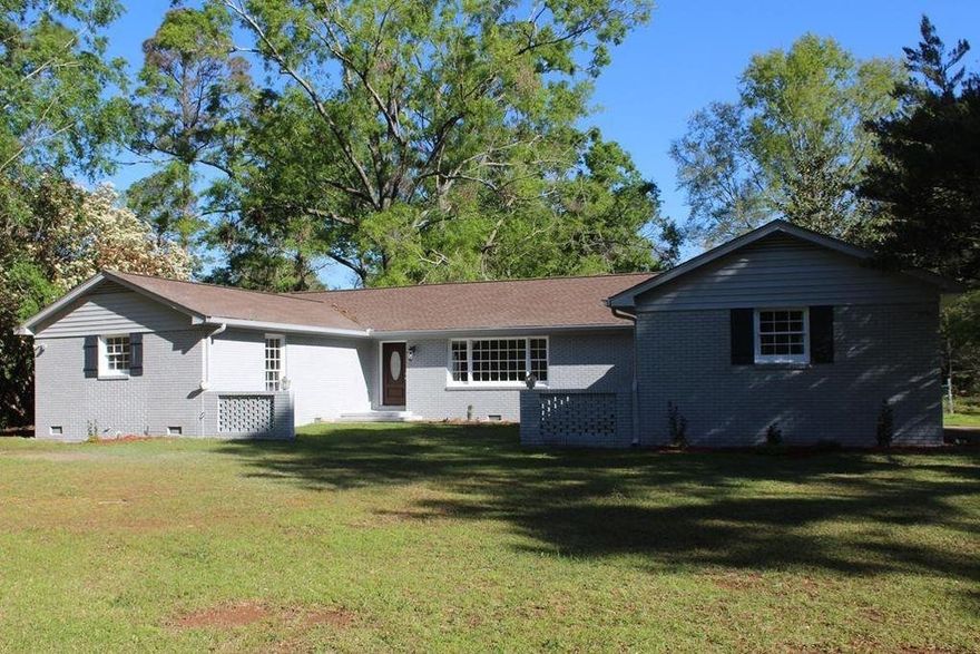 NORTHWEST ALBANY, LARGE YARD & CONVENIENTLY LOCATED TO EVERYTHING! This all brick 3 bedroom 2 bath home has 2166 sqft and sits on 1.01 acre lot! Spacious Formal Living room and formal dining room with laminate floors! Amazing Kitchen complete with new stainless steel appliances, laminate floors, tile backsplash, pantry. The kitchen opens up into a breakfast nook that has a large picture window! Separate Den area with fireplace with pretty mantle! Spacious Master Suite features a walk in closet, updated bathroom with granite tops. The additional bedrooms are a great size and have ample closet space! The second bathroom have new double vanities and new tub and tile surround! Loads of storage throughout the house!   Outside has an open back patio, double carport with extra storage and a huge fenced yard! Super neighborhood close to everything including the by-pass!  You do not want to pass this home up.