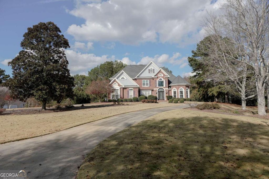 Photo of 105 Cherokee Rose Lane, Fayetteville, GA 30214 (MLS # 10651560)