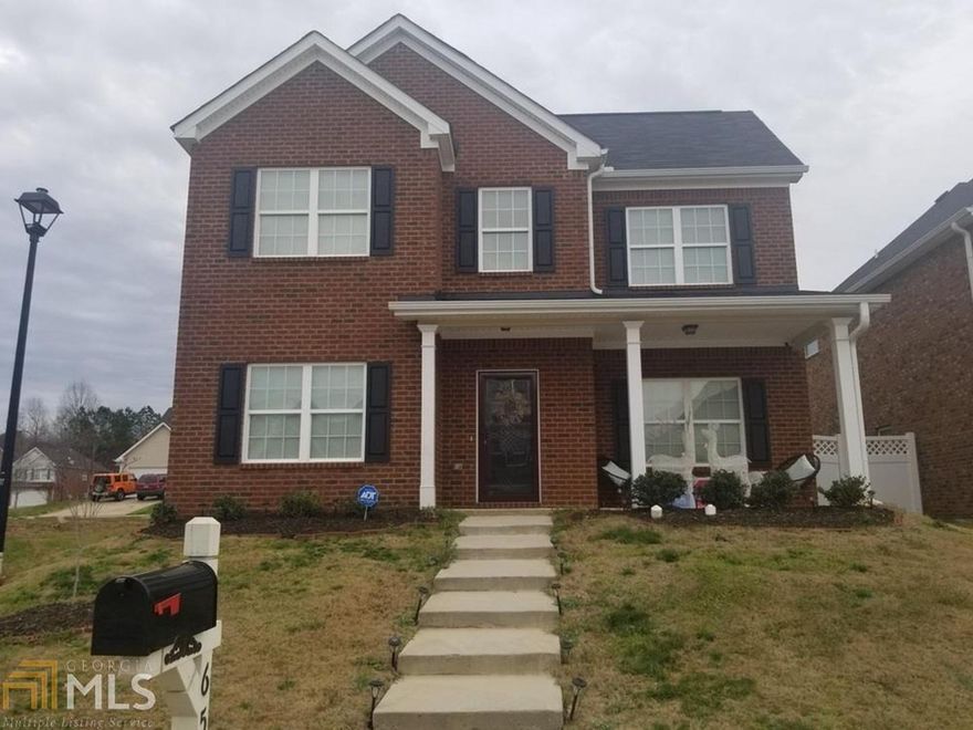 Just In Time to purchase your New Dream home.  This well maintained 2 Story Brick home located in the quiet community of Northbridge Crossing.  You will love the open floor plan. 5 Large  Bedrooms; 4 Upstairs and master on main level.  Main level beautiful master suite with private bath and separate stand-up shower area, double vanity.  Large walk-in Closet in Master.  Separate Dining Room with coffered ceiling. Laundry Room, beautiful kitchen with Island.   Priced to sell.  Come out and see this one before it is gone!  It is a must see and the perfect place to call home!!