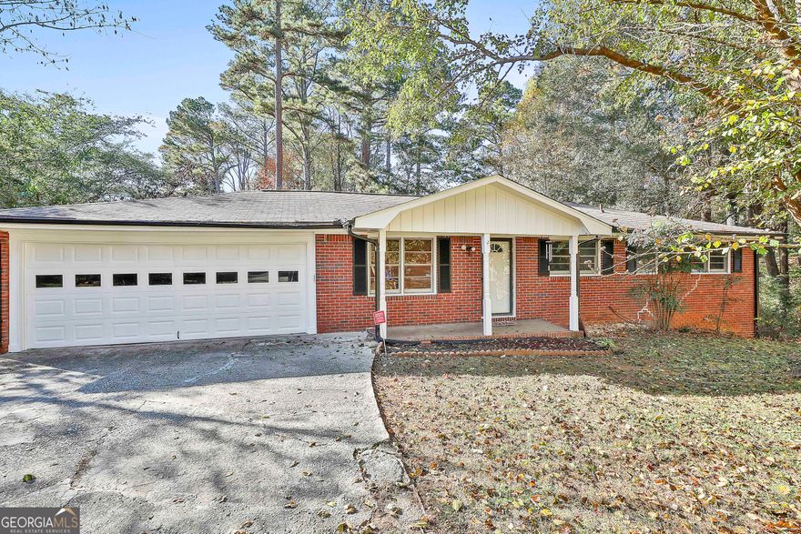 Welcome to this charming 3-bedroom, 1.5-bath brick ranch located in the heart of Douglasville. Built in 1973, this well-maintained home offers approximately 1,196 square feet of comfortable one-level living plus a full unfinished basement! The classic brick exterior provides timeless curb appeal and low-maintenance durability. Inside, you'll find a functional layout with spacious bedrooms and a cozy living area perfect for relaxing or entertaining. The property sits in a quiet, established neighborhood with mature trees and easy access to schools, shopping, dining, and major highways. Whether you're a first-time buyer, downsizing, or looking for a great investment opportunity, this Douglasville gem offers excellent value and convenience. Move in ready!
