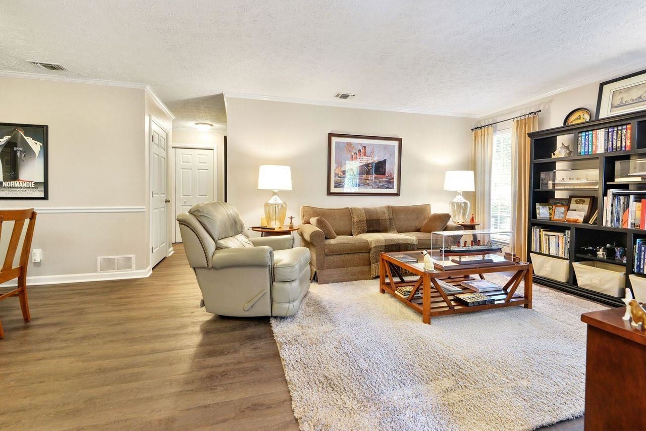 Immaculate updated private ground floor unit! Luxury vinyl plank flooring throughout living/dining and bedrooms. New tile in foyer, kitchen and baths! No carpet. Crown molding added, baseboards and door trim replaced. New raised panel doors with new nickel hardware. All light fixtures replaced. Subway tile above tubs in both bathrooms. New taller vanities in both bathrooms and single tub/shower control. New kitchen soft close kitchen cabinets with dovetail drawer. Granite counters in kitchen, subway tile backsplash. HVAC new in 2020. Water heater, 50 gallon, new in 2020. Washer/Dryer and refrigerator remain with the property. Gated community with swim/tennis, fitnes center, residents car wash. Water, trash and sewer included in HOA Dues. No assigned parking, but allowed two stickers for 2 parking spaces.