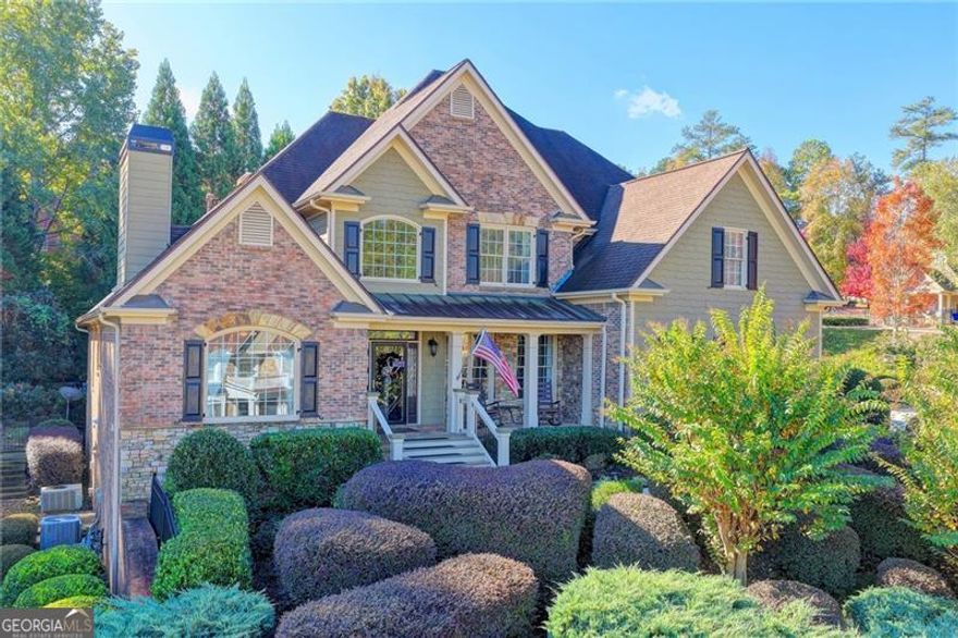 Stunning Entertainer's Dream Home Has All the Outdoor Living Space You Could Ever Need!!  Custom Craftsman w/ Finished Terrace Level & a Floorplan to Serve the Entire Family * Outdoors is Where You Will Spend Your Time Sitting in Front of the Rock Fireplace or On the Sizeable Deck Overlooking the 16x32 Mineral UV System Pebble Tec Heated Pool w/Attached Spa & Flagstone Surround * As You Enter Into the 2-Story Foyer the Study Featuring a Stone Fireplace & Built-In Bookcases is on the Left & Open Formal Dining Room on the Right * In Multiple Locations You Will Find Custom Created Wood Pallet Walls & Ceilings * The Family Room Has a Beautiful Coffered Ceiling w/ Wood Accent Inserts & Stone Fireplace * The Gourmet Kitchen Boasts Maple Stained Cabinetry, Walk-In Pantry & Large Island for Loads of Prep Space * Owners Suite on the Main w/ Door Leading Out to the Deck & Spacious En-Suite Bathroom * Upstairs You Will Find 4 Add'l Large Bedrooms & Office/ Bonus * The Terrace Level Invites Family & Guests to Enjoy Playing Pool, Watching Sports at the Bar or Catching a Movie in the Home Theatre * This Level Also Includes a Bedroom, Full Bath, Sauna Hook-up & Cedar Closet * Upgrades Throughout Incl Bamboo Hardwood Floors, Custom Tile Baths, 4 Yr Old Tankless Hot Wtr Heater, 10 Yr Old Roof, Rear Stairs & More!!