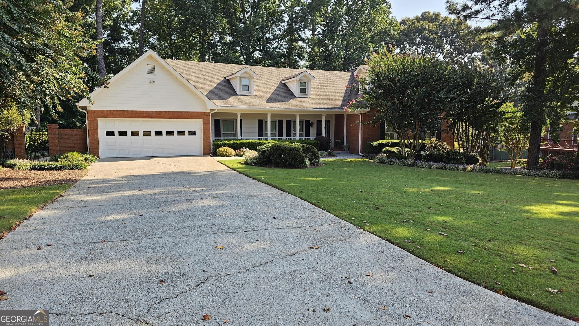 Browning Way is an expansive home and lot in a fantastic neighborhood and community. It sits directly across from Arcado Elementary school and feeds into Trickum Middle and Parkview High. Beautifully landscaped and professionally maintained and managed. Its formal foyer entry way feeds into the front living room and spacious family room with fireplace and built in bookcases. There is a formal full size dining room with tray ceiling off the kitchen. The kitchen is a cooks paradise featuring name brand appliances including a Wolf gas cooktop with down draft venting. Kitchen also features an island, breakfast room and sunroom. The breakfast room opens to a huge deck with view of a beautiful back yard. Main level further includes half bath, laundry room with sink, 2 large bedrooms and 1 large master suite. Master bath has whirlpool tub, separate shower, double vanity sinks and walk-in closet. There is also a very large upper-level loft bedroom with its own full master bath suite including garden tub, separate shower and double vanity sinks. Basement has playroom, 2 bedrooms, full bath and kitchenette. This home is large, well preserved and in great location!