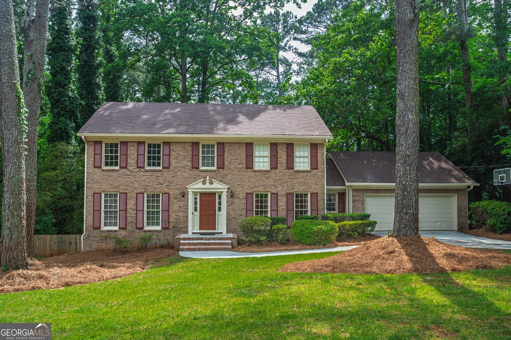 Photo of 3838 Hunting Ridge Drive SW, Lilburn, GA 30047 (MLS # 10771176)