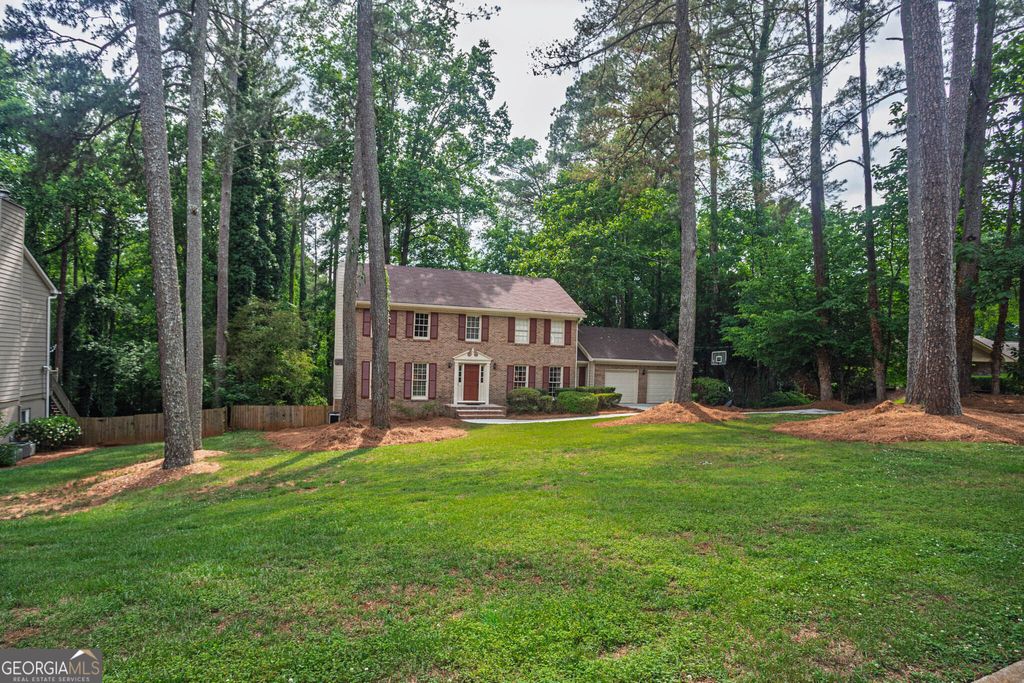 Photo of 3838 Hunting Ridge Drive SW, Lilburn, GA 30047 (MLS # 10771176)