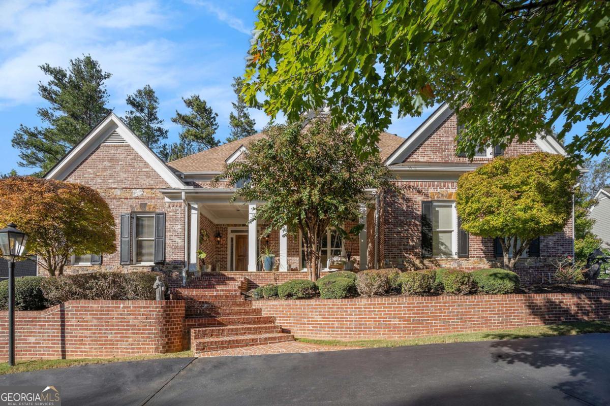 Exciting opportunity for Williamscraft quality and main level living with ample space above and below! Tucked along the charming streetscape in The Park at Latimer Farm, a manicured swim/tennis neighborhood 5 minutes from Kennesaw Mountain Park and trails. Immaculate and turn-key! Best features include: updated master bath, refinished hardwood flooring, new roof, renovated kitchen, and fresh designer paint throughout! Perfect living and entertaining floorplan! Kitchen opens to vaulted family room with full height stacked stone fireplace and built-in bookshelves, keeping or breakfast area, AND screened porch overlooking private backyard lined with trees! Gracious 2-story foyer and living room with floor to ceiling windows give the entry a dramatic look with beautiful views. Owner's suite on the main level has lighted trey ceiling, spa bath, and fantastic walk in and around closet! Library loft is the perfect place to get in some quiet reading time and home office offers the perfect place for privacy. Kitchen features stainless JennAir appliances, double oven, 6 burner cooktop and wine fridge. Finished daylight terrace level features media room, game room, built-in pub bar, billiard room/bedroom and full bath while leaving space for plenty of storage! Step outside for wonderful outdoor living as well! Large, level, sodded, private and fenced backyard has firepit, chimenea, raised beds and stone patio while the front porch (also stone) is the best place to end the day while watching the sunset! Elevated elegance and style describe this masterful home from it's brick and stone architecture to its professional landscaping and hardscapes! Don't miss this gem!