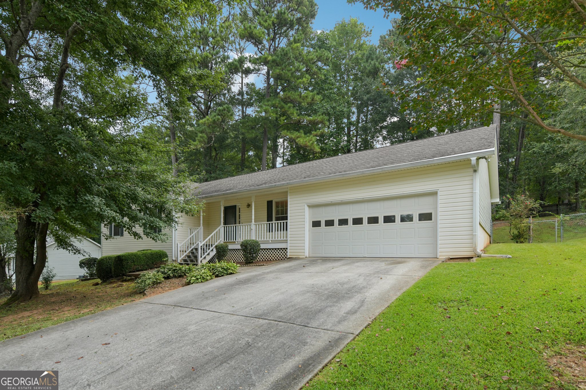 Get ready for one-level living! This 3 bedroom, 2 bath ranch has been beautifully renovated with new flooring, fresh paint, and a freshly painted deck. The kitchen shines with a new gas range, microwave, wall oven, and backsplash. The great room features a stone fireplace with gas logs and a tray ceiling. The owner's suite includes a whirlpool tub, separate shower, new tile surround, and a large walk-in closet. Sitting on a fenced lot with a private wooded backdrop, this home is move-in ready at a fantastic value! You've been waiting for a move in ready home that is priced to sell!! Special financing available for first time home buyers! Reach out to the listing agent for more details.