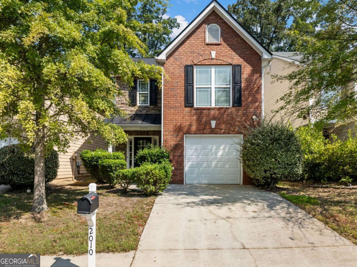 Seller offering $5000 towards closing costs! Discover this meticulously upgraded and MOVE-IN READY 3-bedroom, 2.5-bath gem, ideally located just minutes from Downtown Conyers' vibrant shops, dining, and easy access to I-20. Featuring a bright open-concept layout with a spacious living room flowing into a fully renovated gourmet kitchen boasting freshly painted cabinetry, stunning quartz countertops, and top-of-the-line Samsung stainless steel appliances-all included-complemented by luxurious new LVP flooring and fresh interior paint throughout, with a serene primary suite offering a private en-suite bathroom with a separate shower and soaking tub, secondary bedrooms sharing a spacious full bath, a convenient main-level half bath, a brand-new HVAC system and roof ensuring year-round comfort and peace of mind, plus safety features like smoke detectors and an in-house sprinkler system, all leading to a private back patio for entertaining or relaxing, and a 1-car garage for ample storage and parking, making this move-in-ready home the epitome of modern living that won't last long!