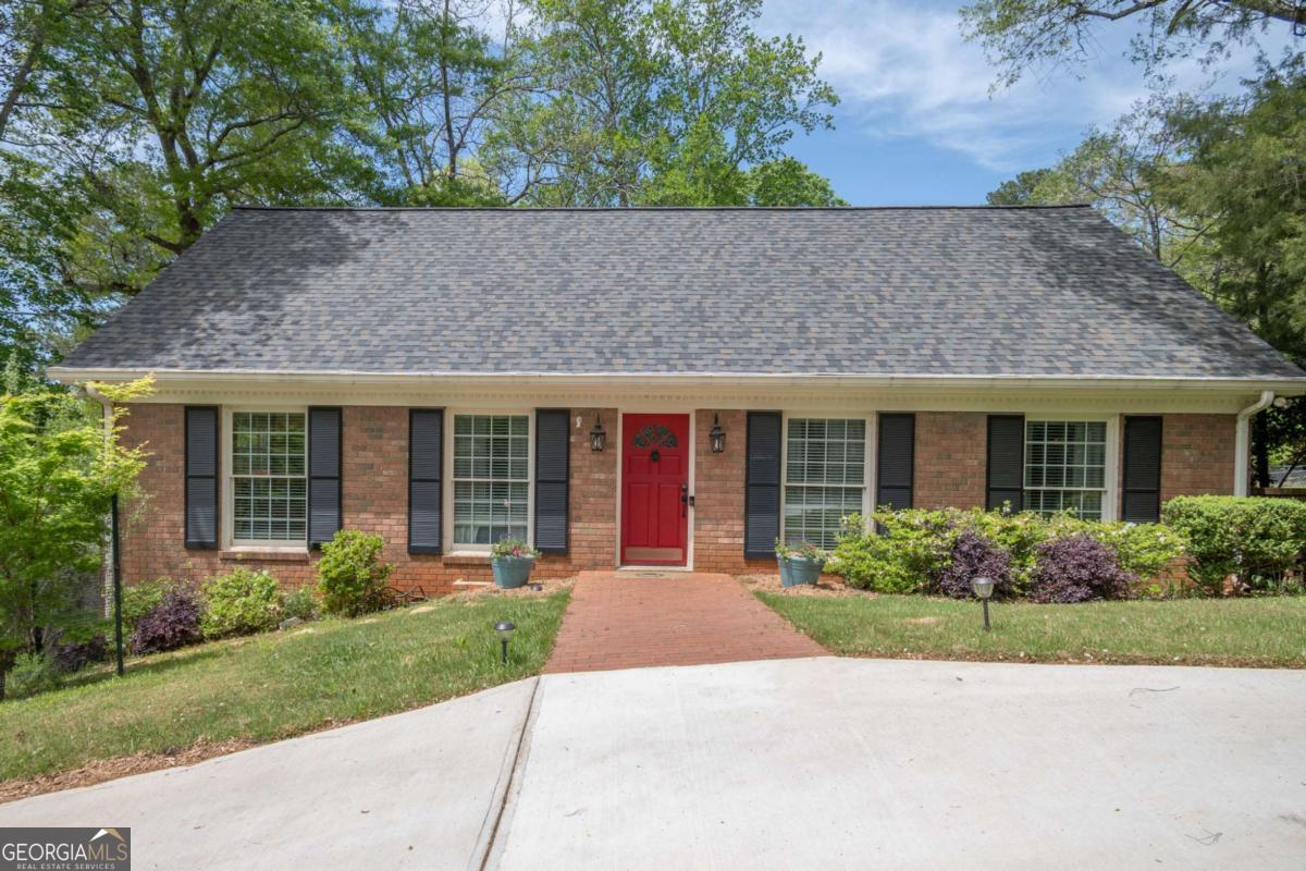 Welcome to this beautifully maintained home nestled in the sought-after Beechwood Hills neighborhood of Athens, GA. Featuring 3 bedrooms and 3 full bathrooms, this home offers the perfect blend of comfort, space, and convenience in one of Athens most established communities. Step inside to discover a spacious open-concept living and dining area, ideal for entertaining or relaxing with family and friends. The eat-in kitchen connects to cozy keeping room complete with a gas fireplace, creating the perfect spot for morning coffee or evening wind-downs. The main level boasts two en suite bedrooms, providing flexibility for a primary suite or guest accommodations. Upstairs, youll find an additional bedroom, full bath, and a loft area a fantastic option for a playroom, home office, or teen hangout. Out back, enjoy your mornings or evenings on the deck overlooking a large, fenced-in backyard with a volleyball court and firepit ideal for outdoor fun and entertaining. The new roof and completely redone circular driveway add peace of mind and curb appeal. All this just 2 blocks from Beechwood Shopping Center, putting grocery stores, dining, and shopping at your fingertips. Plus, youre only a few miles from Five Points and the University of Georgia, making this home a prime location for convenience and lifestyle. Dont miss your chance to own a piece of Athens charm in Beechwood Hills schedule your showing today!