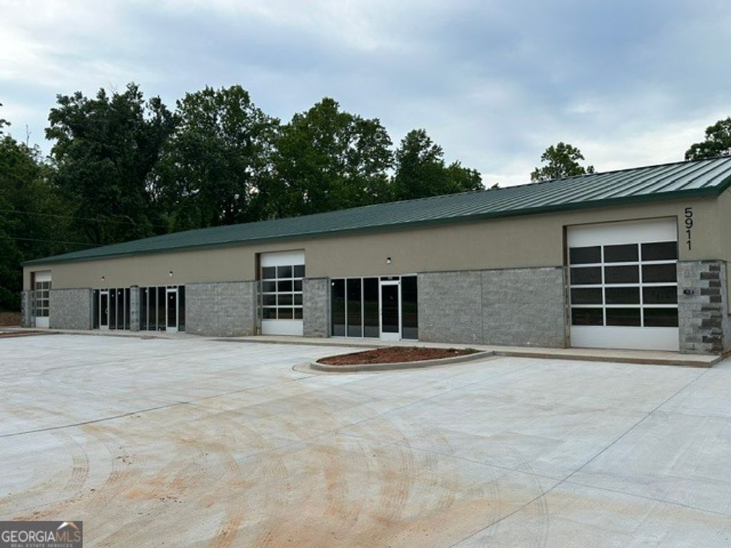 Photo of 5911 Cumming Hwy, Canton, GA 30115 (MLS # 10760422)
