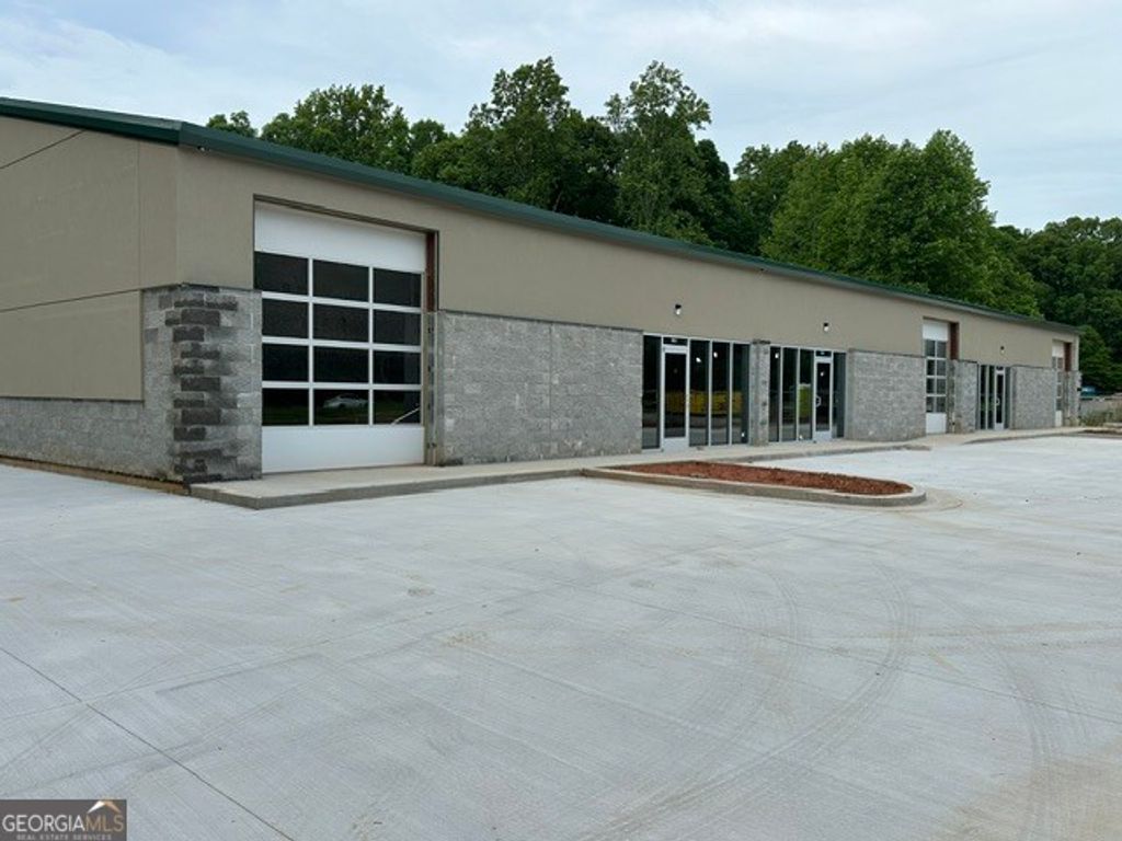 Photo of 5911 Cumming Hwy, Canton, GA 30115 (MLS # 10760422)