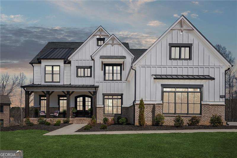 Welcome to the luxurious Rosebriar floorplan by Toll Brothers, nestled in the prestigious Grand Reserve community. This home redefines elegance with every imaginable upgrade, from three stone fireplaces to exquisite architectural details throughout. As you arrive, the inviting covered front porch sets the tone for peaceful mornings with a cup of coffee. The level driveway and 3-car garage add practicality to the homeCOs captivating curb appeal. Step inside to find a thoughtfully designed open floor plan, ideal for todayCOs lifestyle. The family room features a stunning beamed ceiling, adding warmth and character, while seamlessly flowing into the chef-inspired kitchen. Equipped with top-tier stainless steel appliances, a 6-burner gas range, double ovens, and a convenient drop zone off the garage, this space is both beautiful and functional. A casual dining area and a cozy keeping room make it perfect for entertaining or quiet evenings at home. The main level also boasts a private guest suite with an ensuite bath, a refined office for remote work, and an elegant dining room ready to host your next celebration. Upstairs, the primary suite offers a serene retreat with a private keeping room, a fireplace, and a spa-like bath featuring a soaking tub, oversized shower, and generous closet space. Each of the three additional bedrooms on this level has its own private bathroom, ensuring ultimate comfort for family and guests. The unfinished basement is ready for customization, with plans in place for a full finish-out, offering endless possibilities. Outside, the spacious backyard has room for a pool, creating the potential for a private outdoor oasis. Living in Grand Reserve offers more than just a homeCoitCOs a lifestyle. Enjoy premium amenities such as a pool and tennis courts, all while being just minutes from downtown Roswell, Alpharetta, and Milton. Zoned for top-rated schools like Crabapple Crossing Elementary, Northwestern Middle, and Milton High School, this home provides the perfect combination of elegance, convenience, and community.