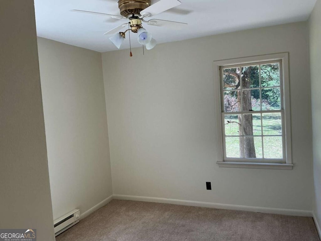Photo of 660 Kirkus Drive SE #A, Conyers, GA 30094 (MLS # 10879537)