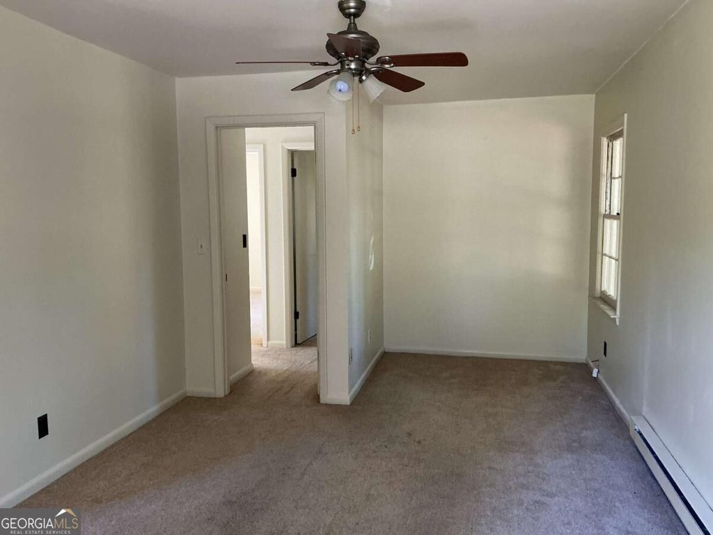 Photo of 660 Kirkus Drive SE #A, Conyers, GA 30094 (MLS # 10879537)