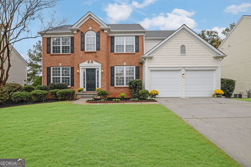 YES, this is the home you've been waiting for! A well-maintained family home to relax, enjoy, and create countless memories, conveniently located in a highly desirable community within the top-rated Chattahoochee High School district and just a short walk to Findley Oaks Elementary, plus no Rental restrictions!!  At first glance, you'll notice a welcoming curb appeal with colorful flower beds and immaculate landscaping. A flat front yard and well-maintained driveway are perfect for outdoor play and entertainment. You step into the home through a bright two-story foyer, which leads you to a spacious fireside living room and an expansive kitchen with an open island, abundant counter space, and plenty of cabinetry. The main floor also features a large dining room, a formal living room, and a spacious laundry area. Natural light fills the home with a soft, warm, welcoming glow. Venture Upstairs to three bright and comfortable bedrooms, along with an oversized owner's suite featuring an elegant tray ceiling. The master bathroom offers his-and-her vanities, new faucets, a walk-in closet, a shower, and a cozy tub. Another full bathroom upstairs ensures convenience for family and friends.  Additionally, Kitchen opens to a large wooden deck overlooking a lush, clean private backyard, offering a safe space for children and pets to grow and play. The unfinished basement is ready for your personal touch, ideal for a home gym, media room, office, or additional living space or space to rent out; the possibilities are endless.  A new concrete patio off the terrace creates even more space to unwind, entertain, relax, or simply enjoy peaceful moments surrounded by nature. Level green backyard offers an ideal setting for family gatherings, a grill night, or quiet moments of reflection to sink in. Recent updates include fresh interior paint, modern light fixtures, ceiling fans, new faucets, and updated vanity lights, enhancing the home's clean, refreshed feel. This family-friendly neighborhood also offers fantastic community amenities, which include a pool, tennis courts, a playground, and a clubhouse.  Another amazing perk is the Location! The house is only a few minutes away from schools, shopping outlets, a plethora of dining options, entertainment venues, and close to Avalon, with convenient access to hospitals and major highways.  This "turnkey and move-in ready," freshly painted house eagerly awaits you and your family to make it your own.    We warmly invite you to visit and experience all that this exceptional home has to offer! Welcome home!