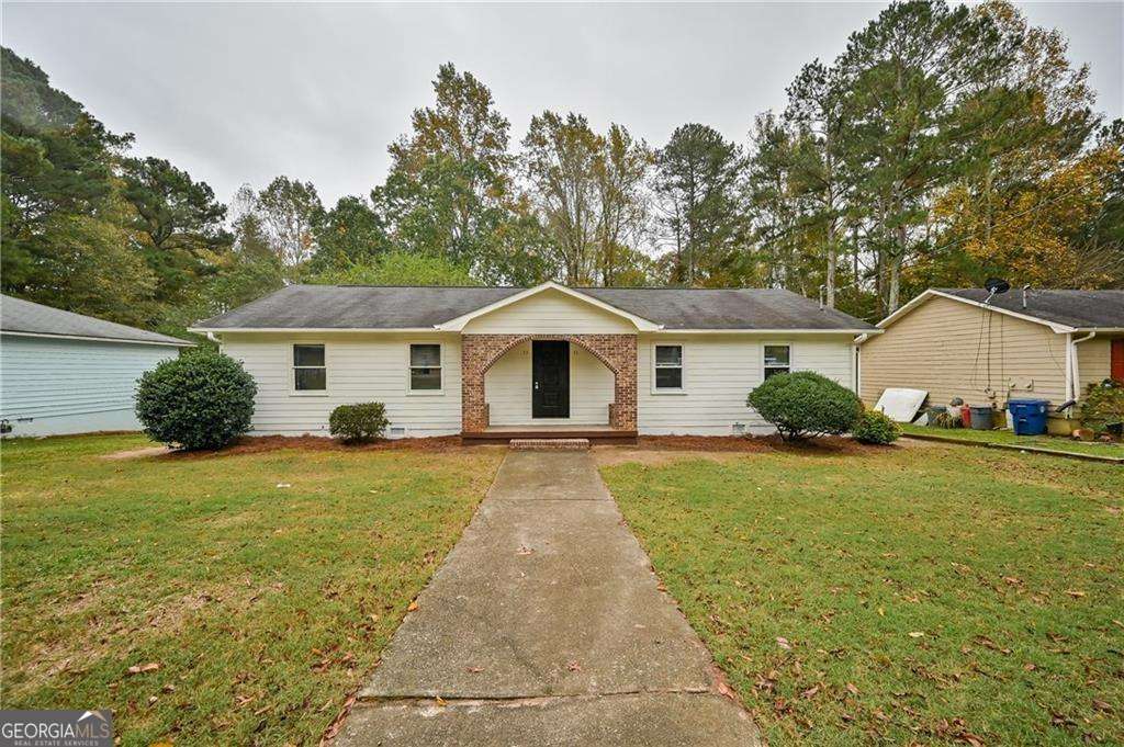 Turnkey duplex investment opportunity! This income-producing property features two spacious and updated units, each currently rented at $1,600/month for a total of $3,200/month in rental income. Both leases are active through December 2025 and April 2026, providing immediate and stable cash flow. One unit features brand-new vinyl flooring, and a new HVAC system has been recently installed. Inside, each unit offers a modern galley kitchen with white cabinetry, updated countertops, and included appliances. Bathrooms are clean and updated with a mix of shower/tub combos and walk-in showers. Bedrooms are generously sized with plenty of natural light. Step outside to enjoy a large backyard and a newly built wooden deck-perfect for relaxing or entertaining. With fresh paint, modern finishes, and reliable tenants already in place, this property is ideal for both new and experienced investors looking for a hassle-free, cash-flowing asset in a quiet and well-located neighborhood. Property is sold with tenants in place.