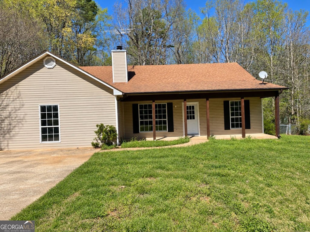 Photo of 440 E Country Woods Drive, Covington, GA 30016 (MLS # 10850252)