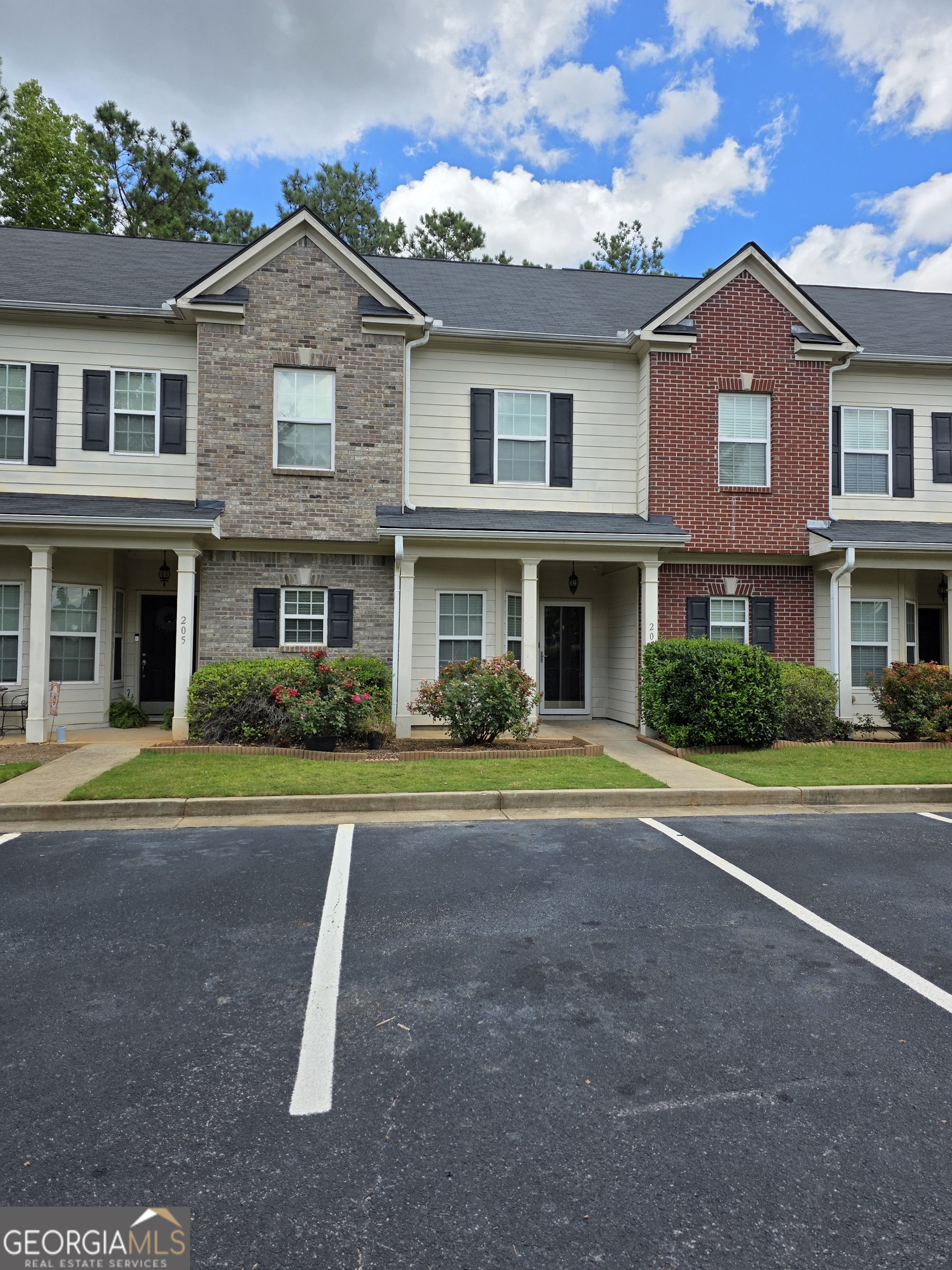 Come see this charming townhome located in the sought after Stonebridge subdivision in Newnan. Just minutes to I-85! Convenient to the airport, shopping, many restaurants, and the beautiful downtown area of Newnan, The City of Homes. This neighborhood has all of the amenities you will need. The amenities include an Olympic size pool, exercise facility, clubhouse, two playgrounds, two dog parks, nature trails, and tennis courts. This neighborhood is connected to the LINC Trail which provides multiple opportunities for many outdoor activities. This three-bedroom, two and 1/2 bath Townhome features LVP flooring throughout the home, a large separate dining area, eat-in kitchen, and a private patio! The HOA offers yard maintenance and general maintenance of all of the facilities.