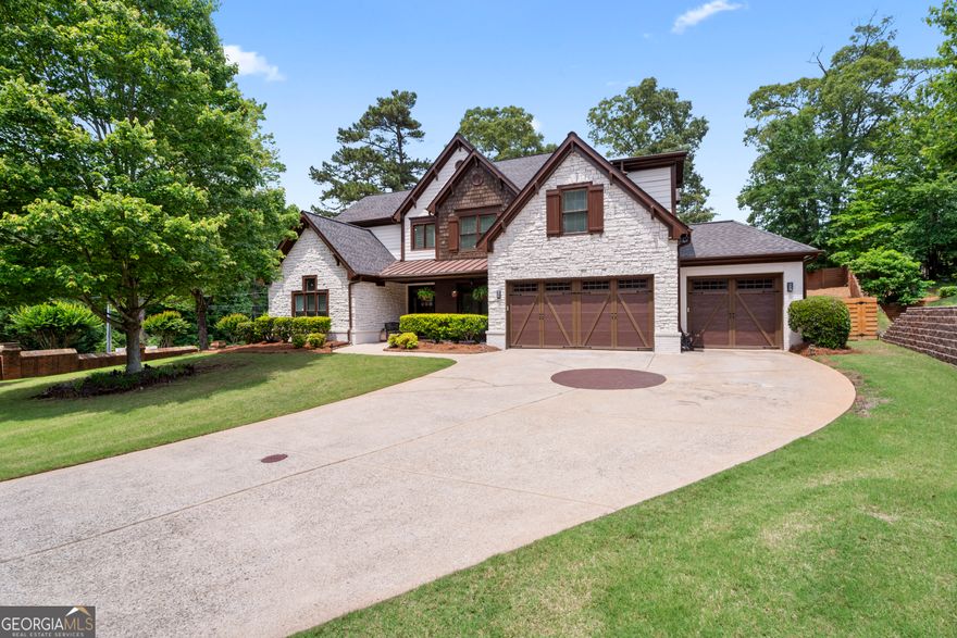 If luxury, location, top-rated schools, and convenience are on your wishlist, don't walk, run to this stunning home in the heart of East Cobb! Just one mile from the soon-to-be brand-new Sprayberry High School, this beautifully refreshed residence offers the perfect blend of elegance and functionality. Step inside to discover a thoughtfully maintained home with fresh interior paint, all-new stainless steel appliances, updated lighting fixtures, new mirrors, and even new switch plates and outlet covers every detail has been carefully curated. The two-story grand room creates a dramatic first impression, and the main-level layout is ideal with both the primary suite and a guest suite on the first floor. The primary suite is a true retreat, complete with a cozy fireplace and ample space for rest and relaxation. The guest suite offers convenient main-level access-perfect for visitors, multigenerational living, or little ones who need to stay close. The open-concept kitchen flows seamlessly into a sunlit breakfast room and connects to a formal dining room-an ideal setup for both everyday living and entertaining. A spacious three-car garage adds everyday practicality. Upstairs, you'll find three en-suite bedrooms, a comfortable family room, and a versatile bonus room each space designed for easy, livable luxury. And it doesn't stop there. The Texas-styled upstairs basement offers even more flexibility create a private suite, a man cave, recreation space, or multigenerational living quarters. The possibilities are endless. 2265 Venture Dr. is more than a home it's a lifestyle. Spacious, versatile, and ideally located, this is your chance to own a true gem in East Cobb. Contact your agent today to schedule your private showing of this must-see property!