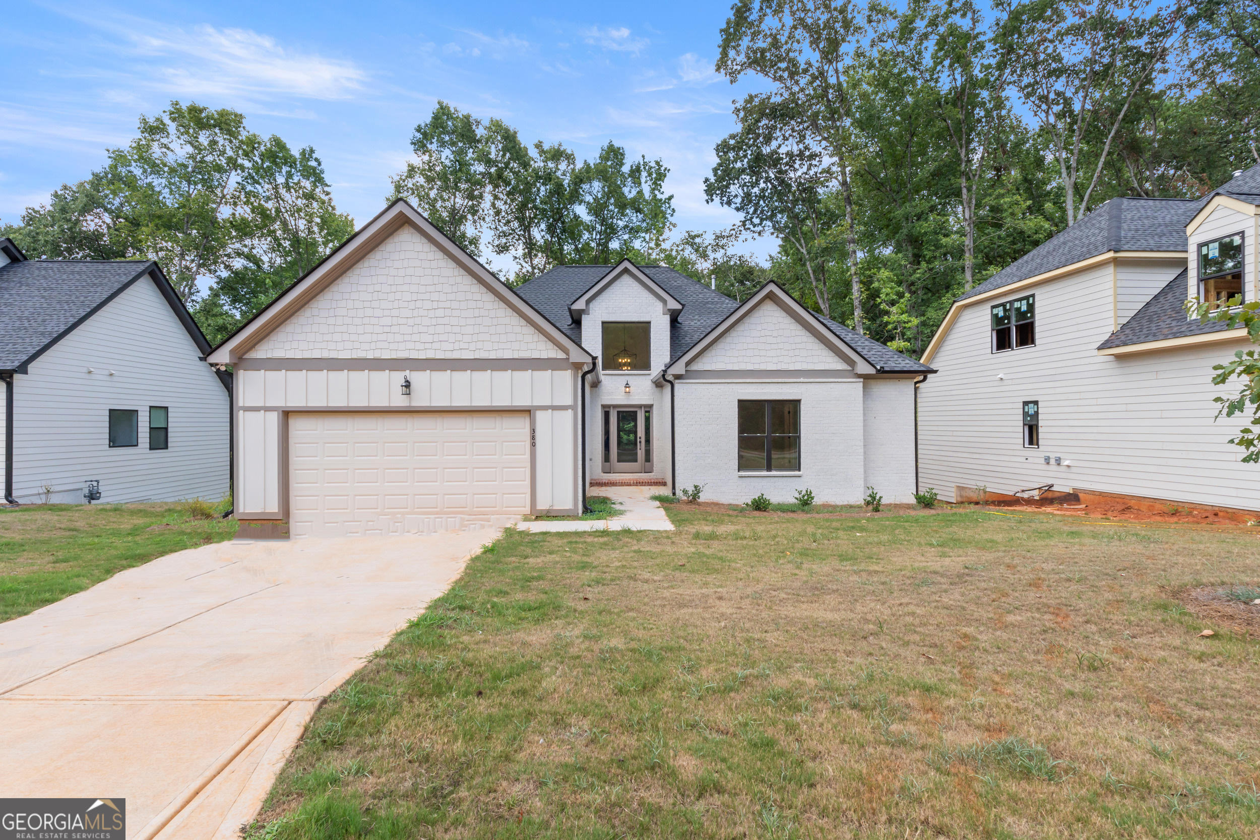 Welcome to your new home in beautiful Athens, GA home of the Georgia Bulldogs! River Ridge is a new community with nature trails adjacent to the Oconee River Greenway. River Ridge is close to UGA, the Vet School, downtown Athens & Wire Park-Watkinsville, our newest eatery & gathering venue. This convenient location features QUALITY custom homes by Stephens Communities, a 50+ year experienced builder who is onsite and available. Built with quality & expertise you will find a luxury home at an affordable price. Designer built floor plans with easy flow of living and entertaining you will be impressed as you walk through the doors of your new home. Featuring hardwood floors, gourmet kitchens, quartz upgraded countertops, tile bathrooms, soaking tubs & vaulted or tray ceilings. These energy efficient homes were built with spray foam insulation, low e windows, Trane HVAC, and prewired for SMART HOME ability. This home is the Scotsburg plan on a basement with a large living room & formal dining room plus gourmet kitchen featuring a large breakfast area and lots of windows with french doors out to the deck. This home backs up to the green space with beautiful trees and features a double deck with full basement & deck on the basement level also. Call now for a tour. Agents also onsite most days.